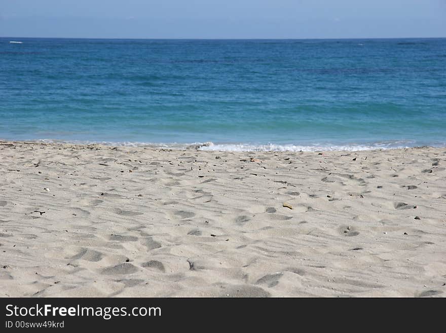 White beach and blue-green sea