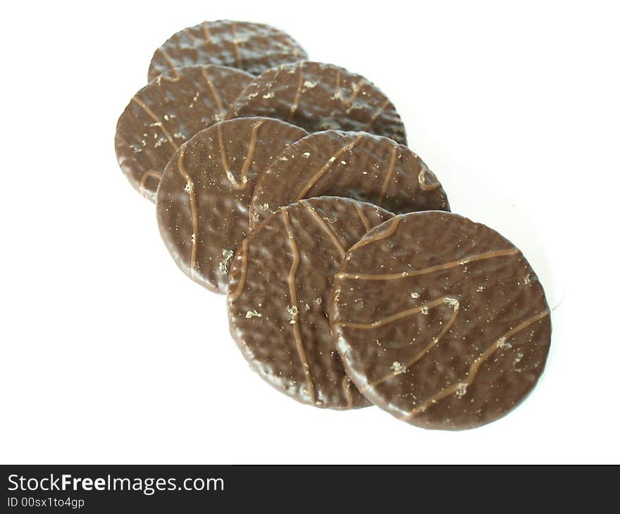 Photo of chocolate cookies isolated on white close view