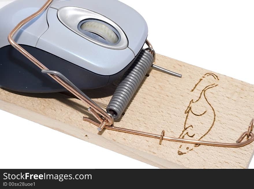 A computer mouse caught in a mousetrap. A computer mouse caught in a mousetrap