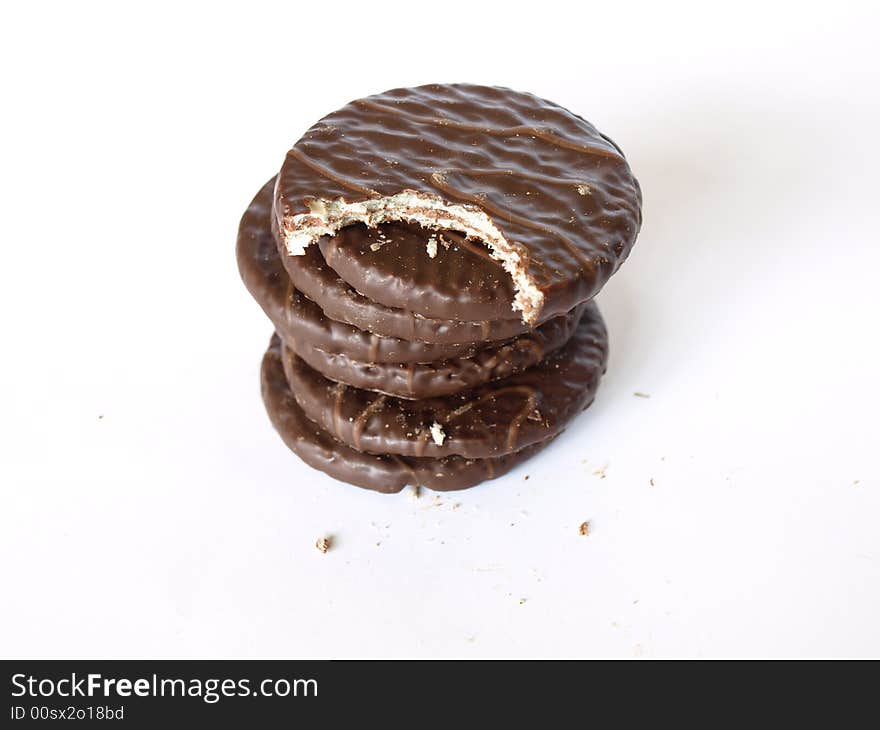 Chocolate cookies isolated on white close view