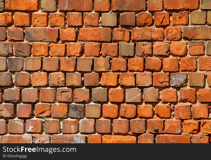 An old brick and mortar wall for backgrounds or texture. An old brick and mortar wall for backgrounds or texture