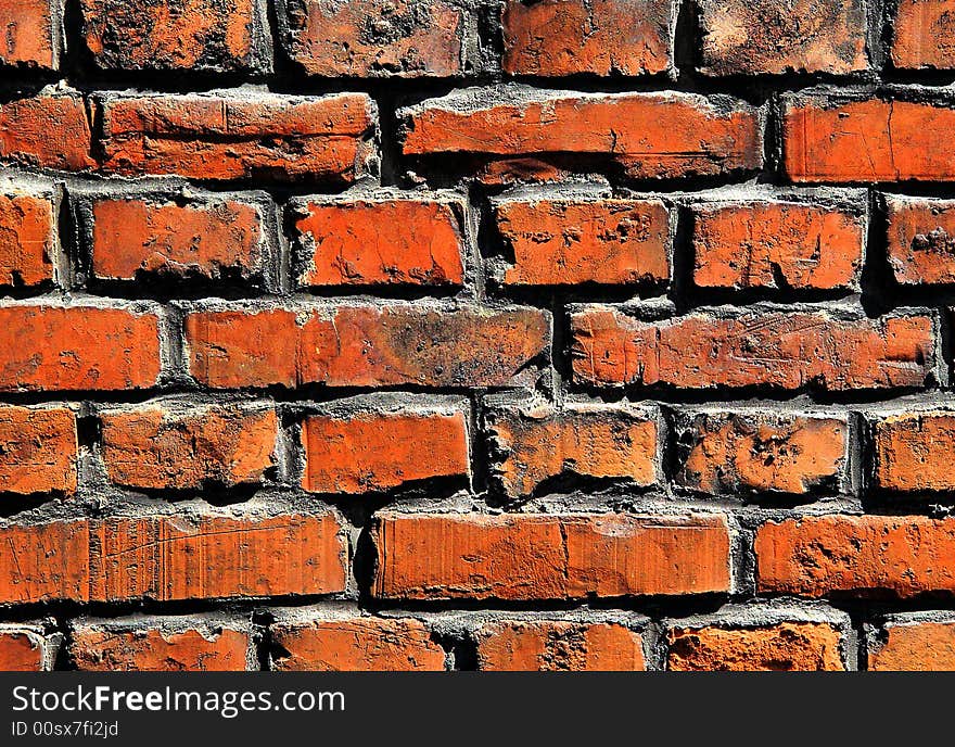 An old brick and mortar wall for backgrounds or texture. An old brick and mortar wall for backgrounds or texture