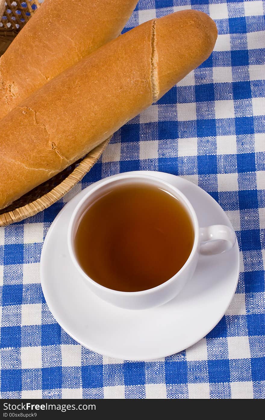 Two bun on the plate and cup of tea. Two bun on the plate and cup of tea