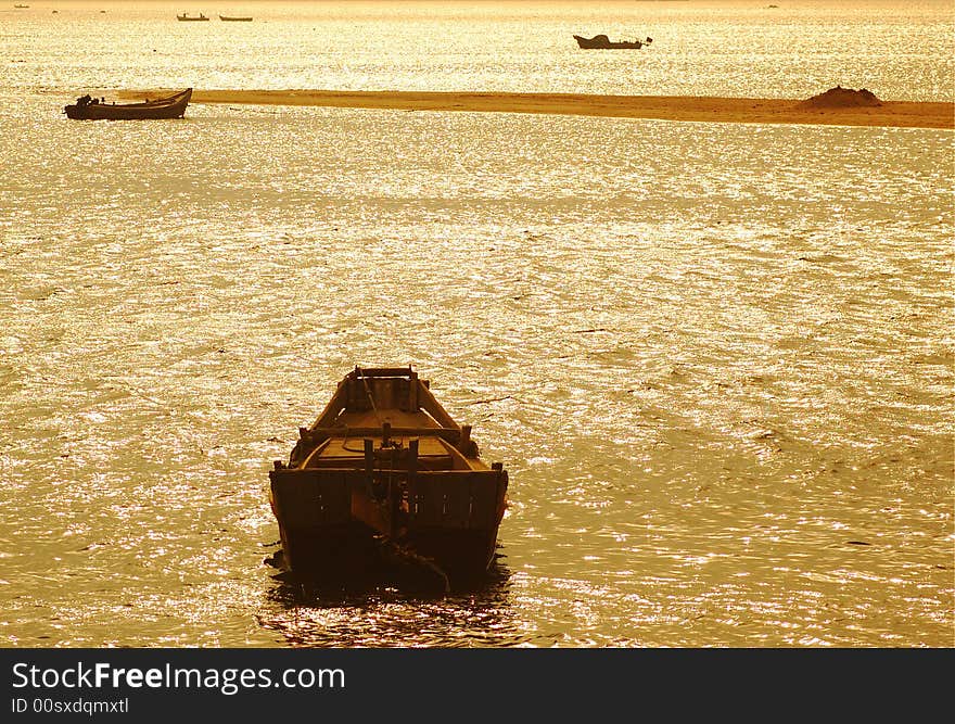 Photography under Shandong Weihai setting sun and boat. Photography under Shandong Weihai setting sun and boat