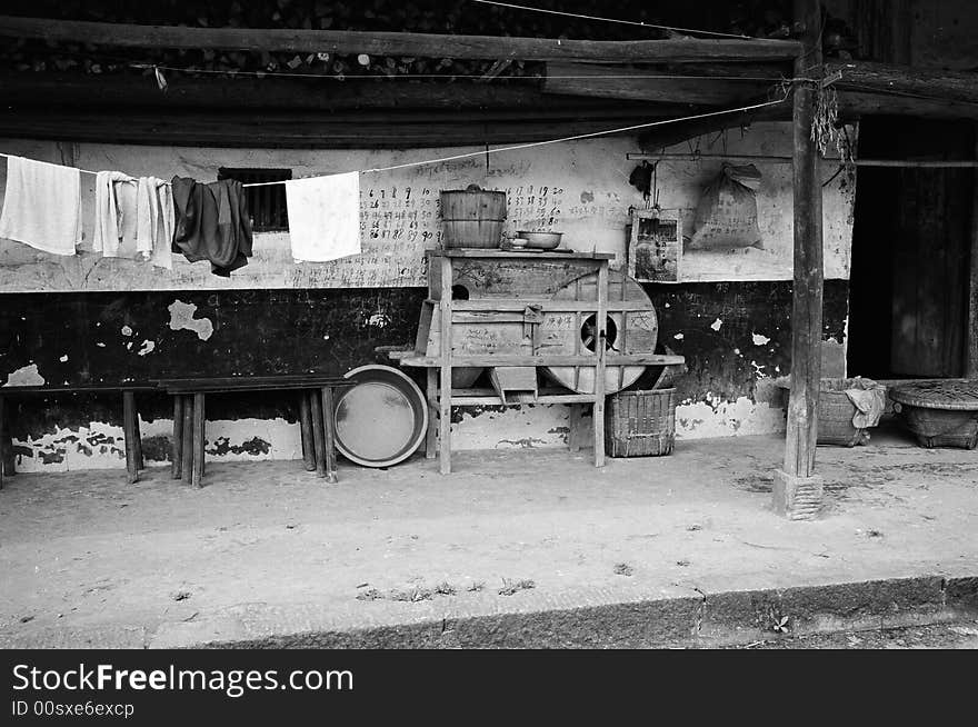 Farmer's cortyard, winnower and other tools. taken in Sichuan Province, China.Leica mp M35F1.4,Tmax100. Farmer's cortyard, winnower and other tools. taken in Sichuan Province, China.Leica mp M35F1.4,Tmax100