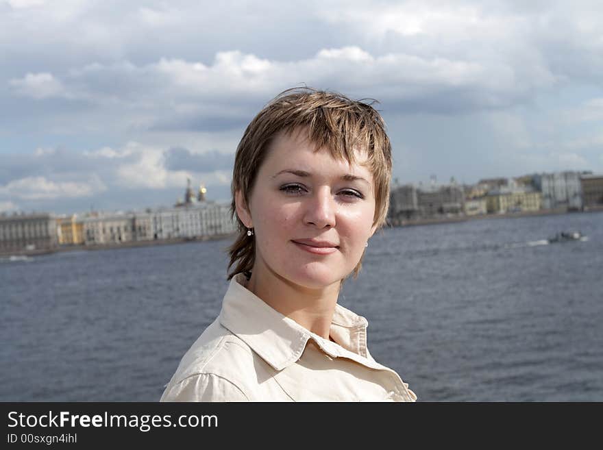 Portrait of the woman on the Neva background. Portrait of the woman on the Neva background