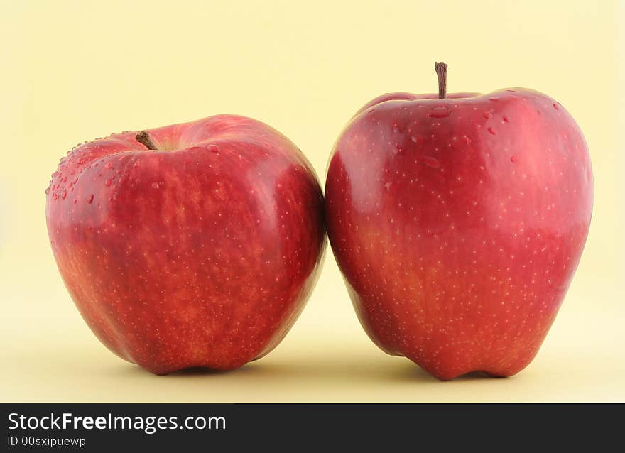 Great Red Apples On Yellow Background