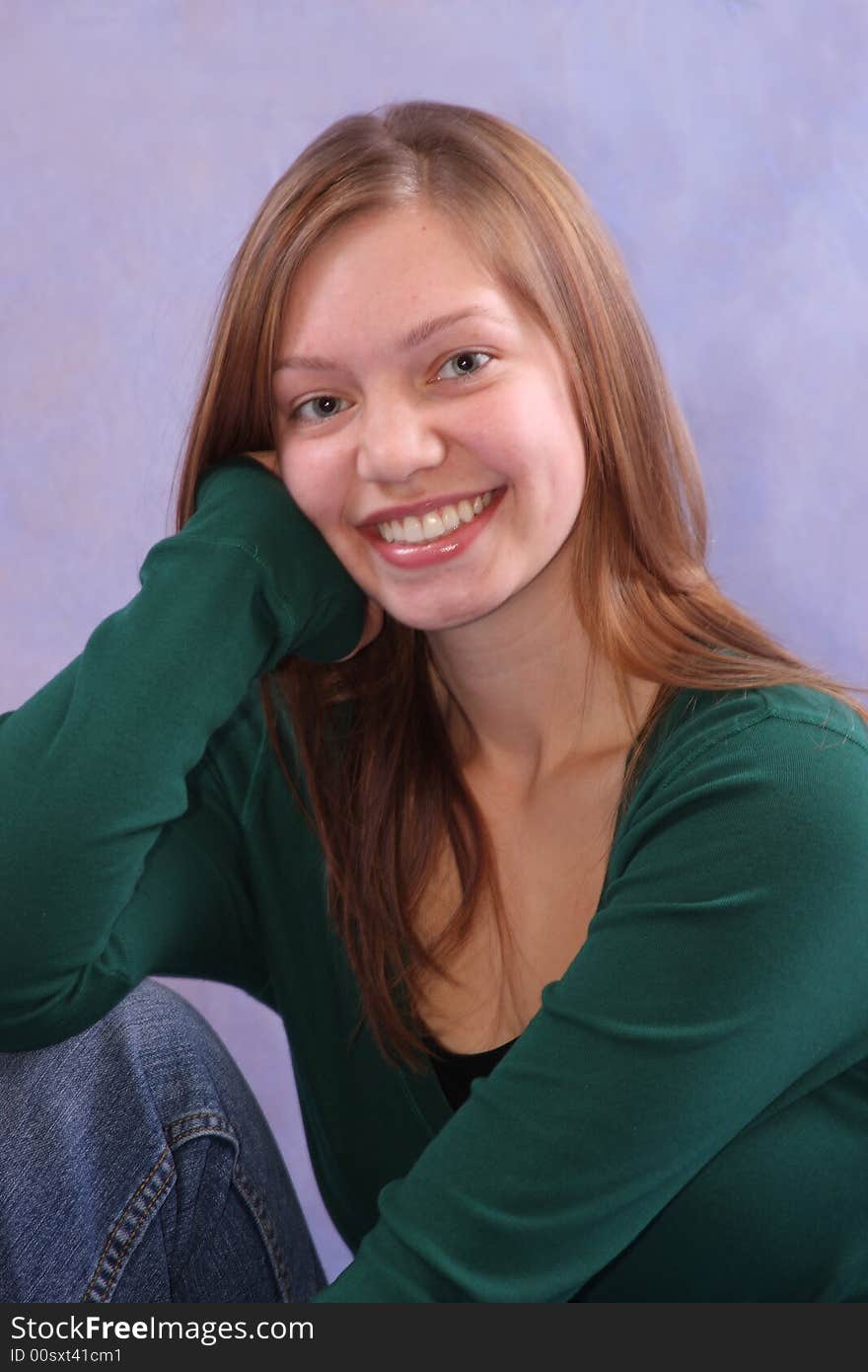 A portrait of a casual girl in a green shirt