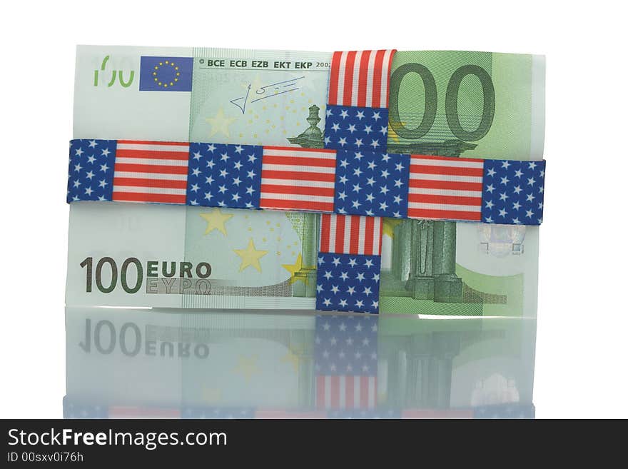 Hundred euro bill wrapped with US banner patterned tape. Hundred euro bill wrapped with US banner patterned tape