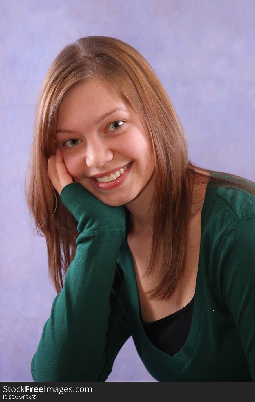 Portrait of a girl dressed in a green shirt. Portrait of a girl dressed in a green shirt