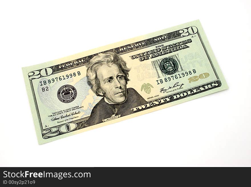 Twenty dollar bill over a white surface. Twenty dollar bill over a white surface