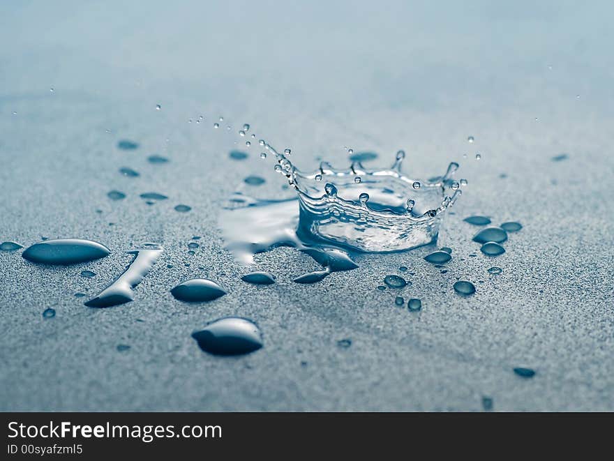 Water drop splash crown in blue tones. Water drop splash crown in blue tones