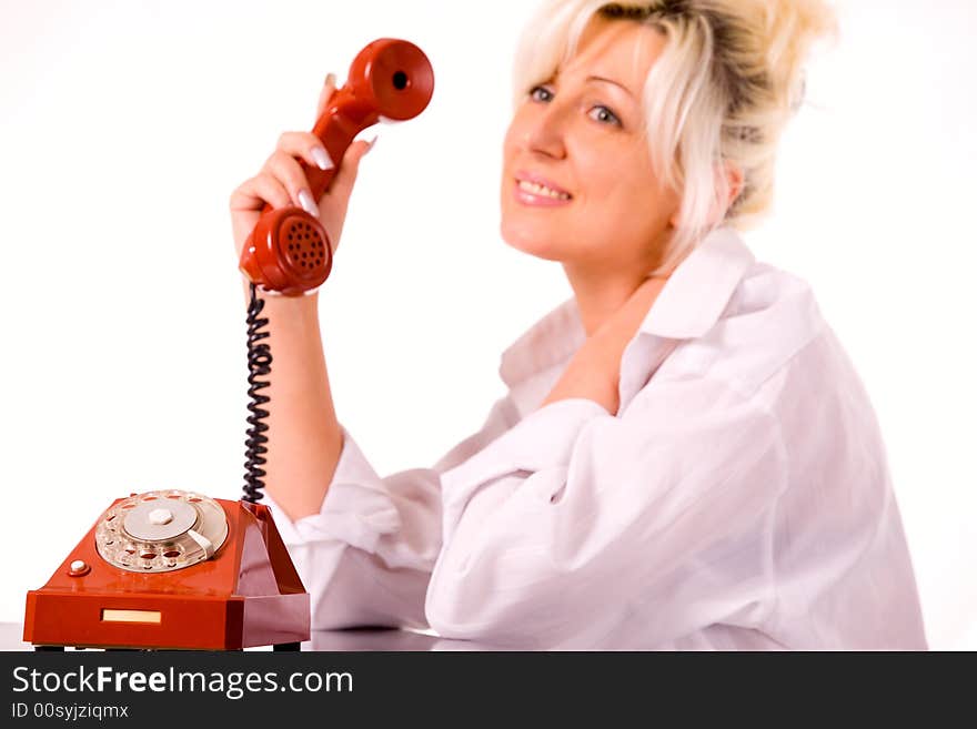 Blond caucasian model with red phone