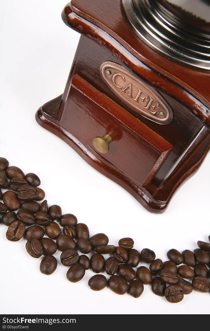 Coffee beans with grinder