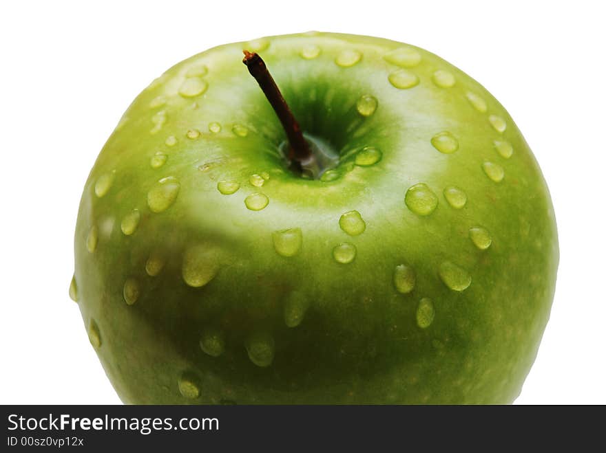 Green apple with water drops  isolated