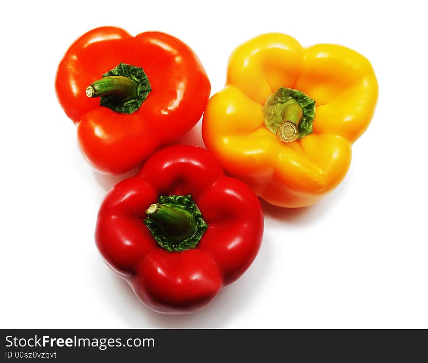 Three peppers red, orange and yellow