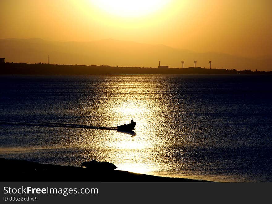 A boat in sunset at the Caspian Sea