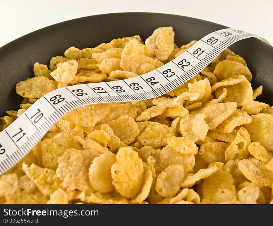 Corn flakes breakfast with measure