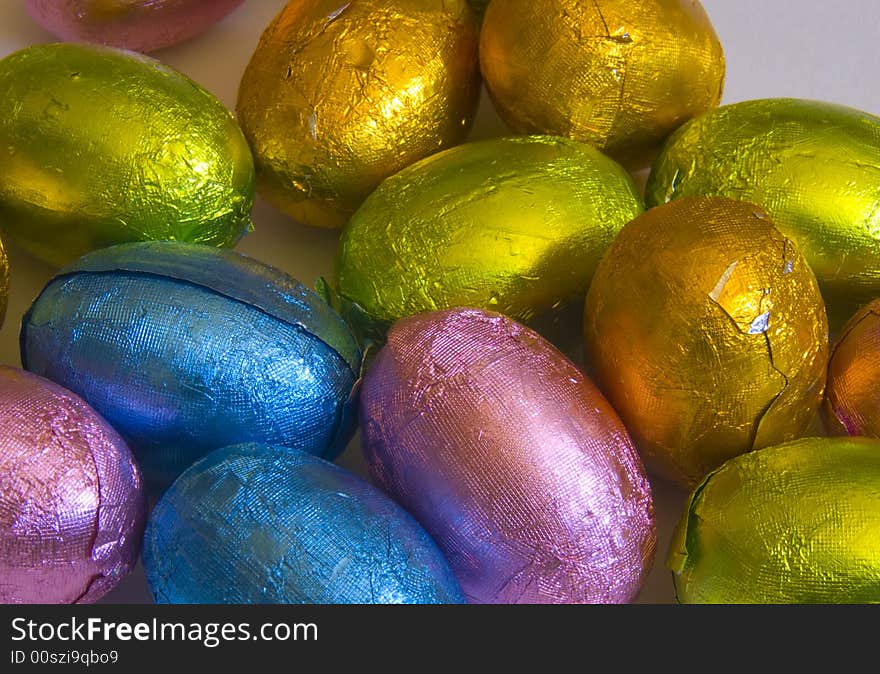 Assortment of multi-coloured chocolate easter eggs. Assortment of multi-coloured chocolate easter eggs