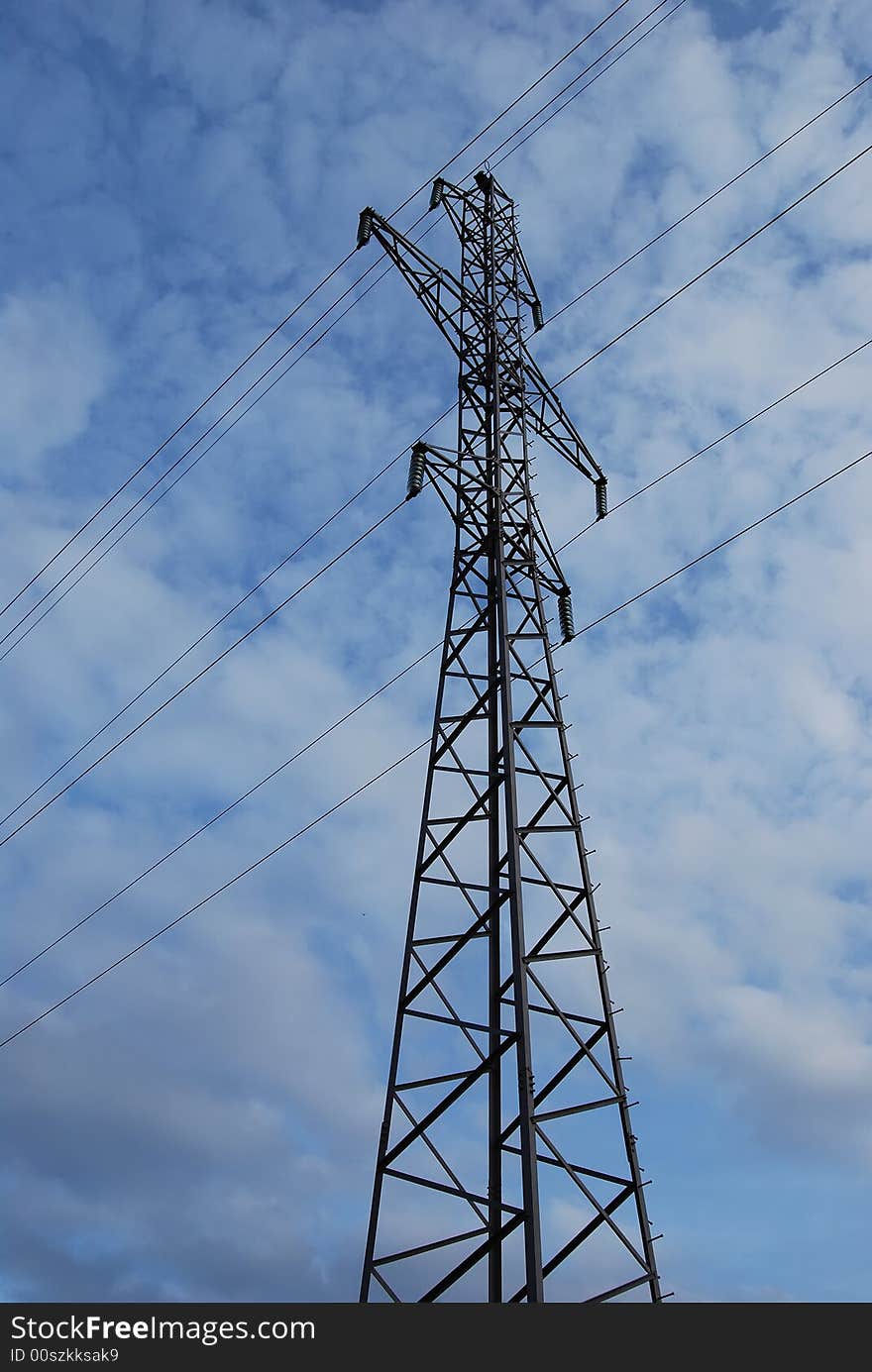 Electric wires in cloudy sky. Electric wires in cloudy sky