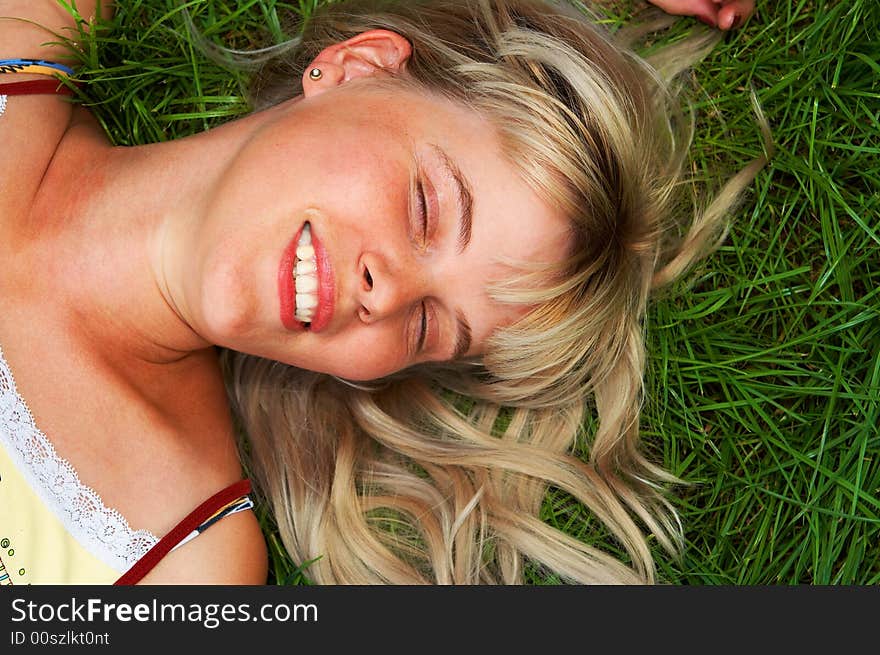 Woman lie on grass