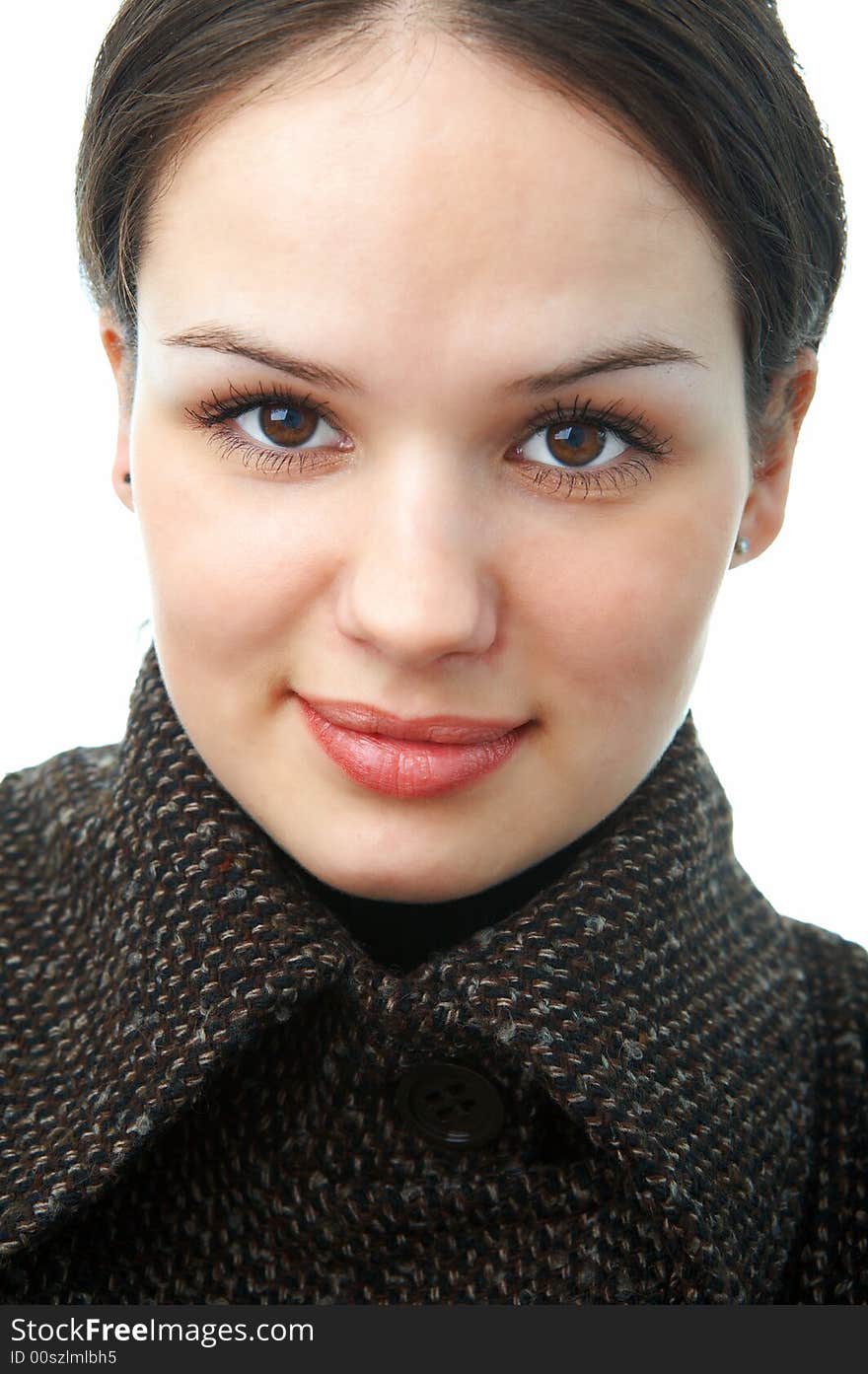 Woman in autumn coat on white background