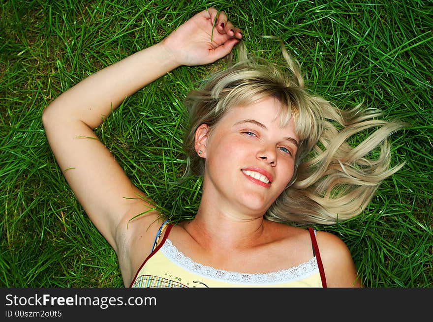 Woman lie on grass