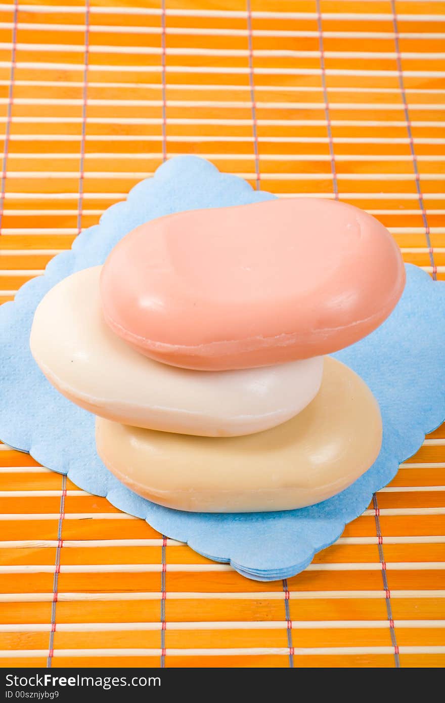 Soap on the bamboo table-cloth