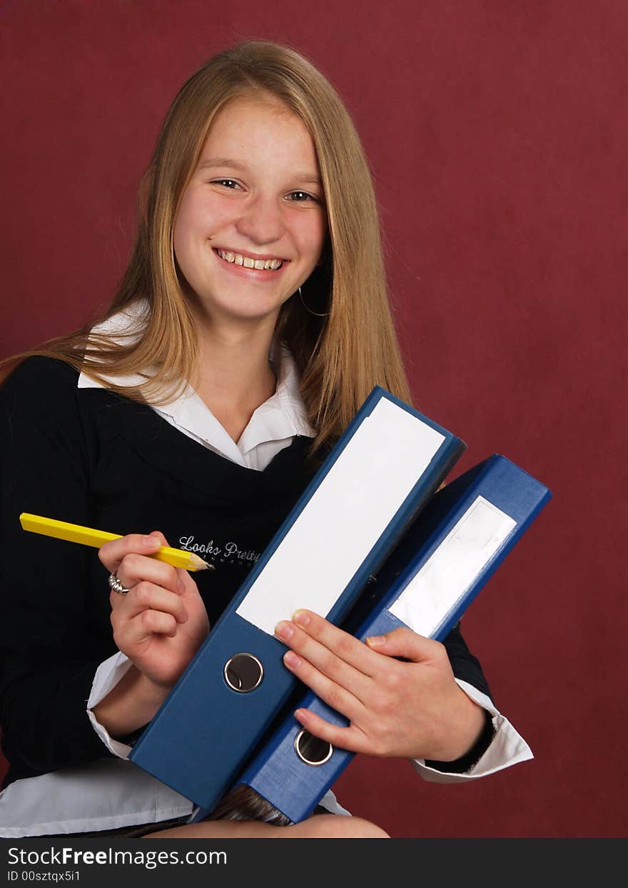 young business women whis folders and pencil