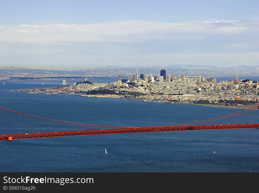 Golden Gate Bridge and San Francisco with cloudy skies