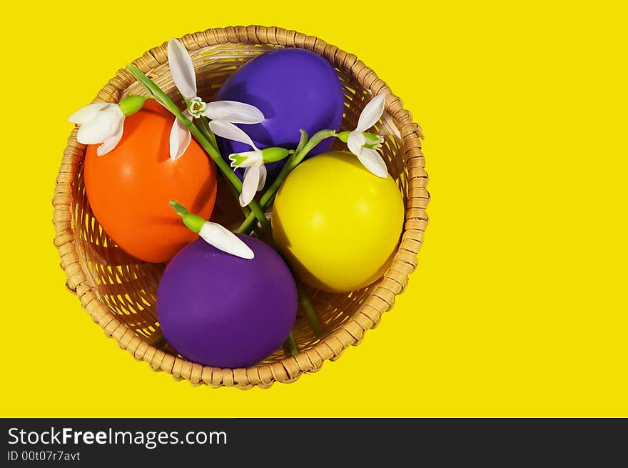 Easter Basket With Snowdrops And Eggs