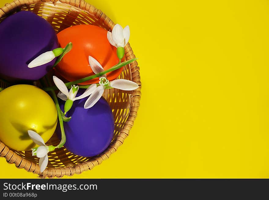 Easter Basket With Snowdrops And Eggs