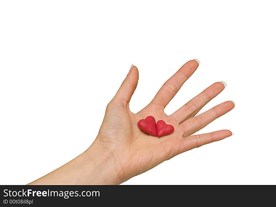 Two red hearts in the hand