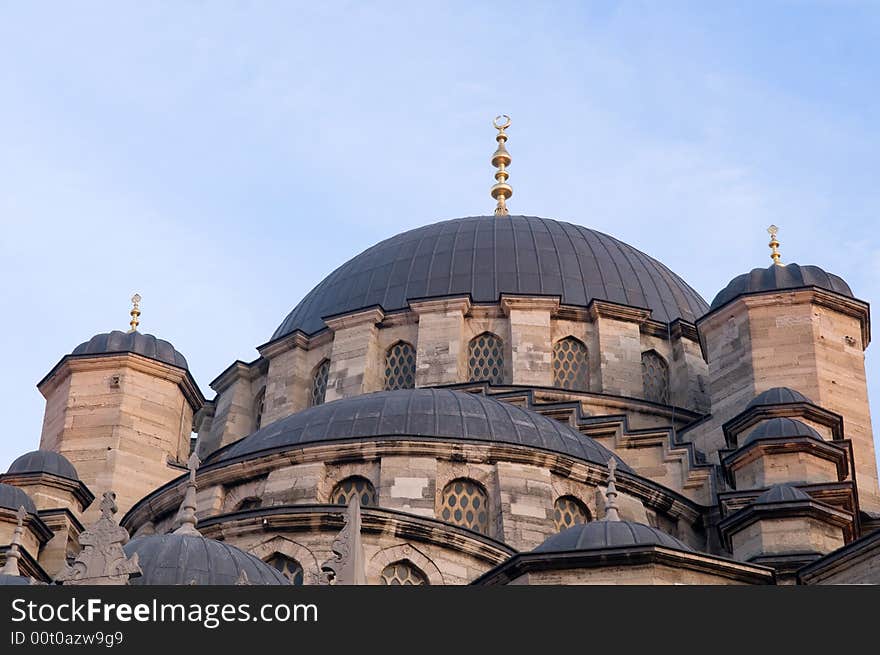 The Yeni Mosque, New Mosque or Mosque of the Valide Sultan (Turkish: 'Yeni Cami, Valide Sultan Camii') (1597 - 1663) is an Ottoman mosque located in the Emin�n� district of Istanbul, Turkey. It is situated on the Golden Horn at the southern end of the Galata Bridge. Together with the Galata Bridge the New Mosque is one of the best-known sights of Istanbul. An elegant fountain for ablutions stands