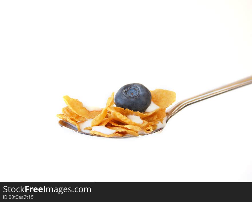 Spoonful of Cereal and a Berry