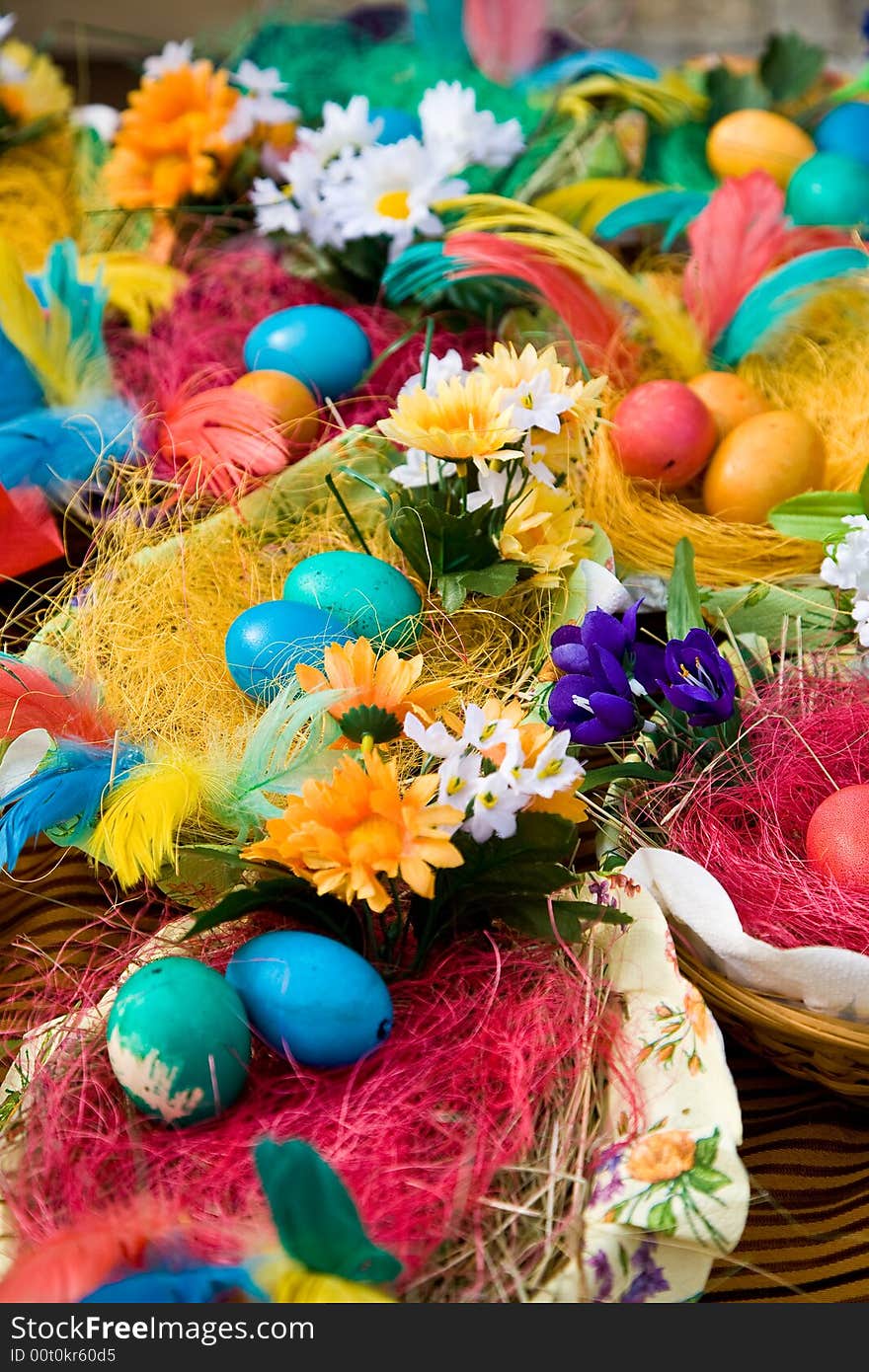 Easter eggs on the wooden plate