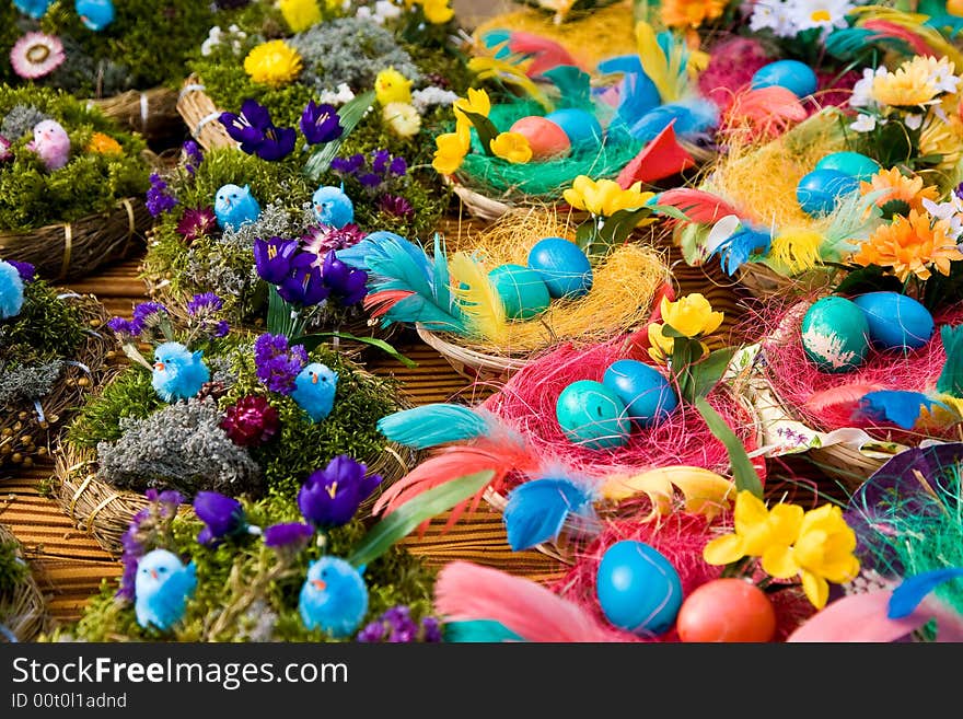 Easter eggs on the wooden plate