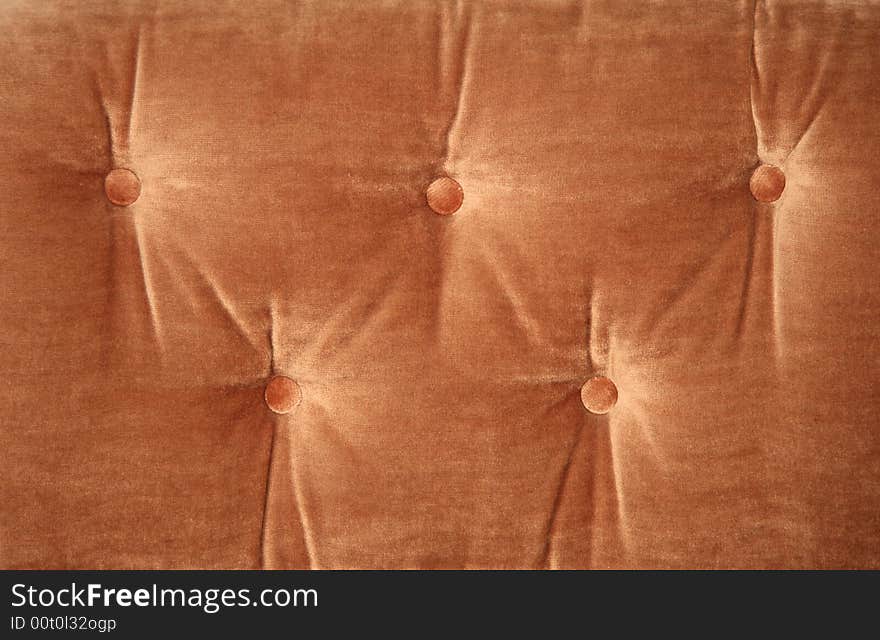 Close up detail of the cushion on an old retro couch. Close up detail of the cushion on an old retro couch