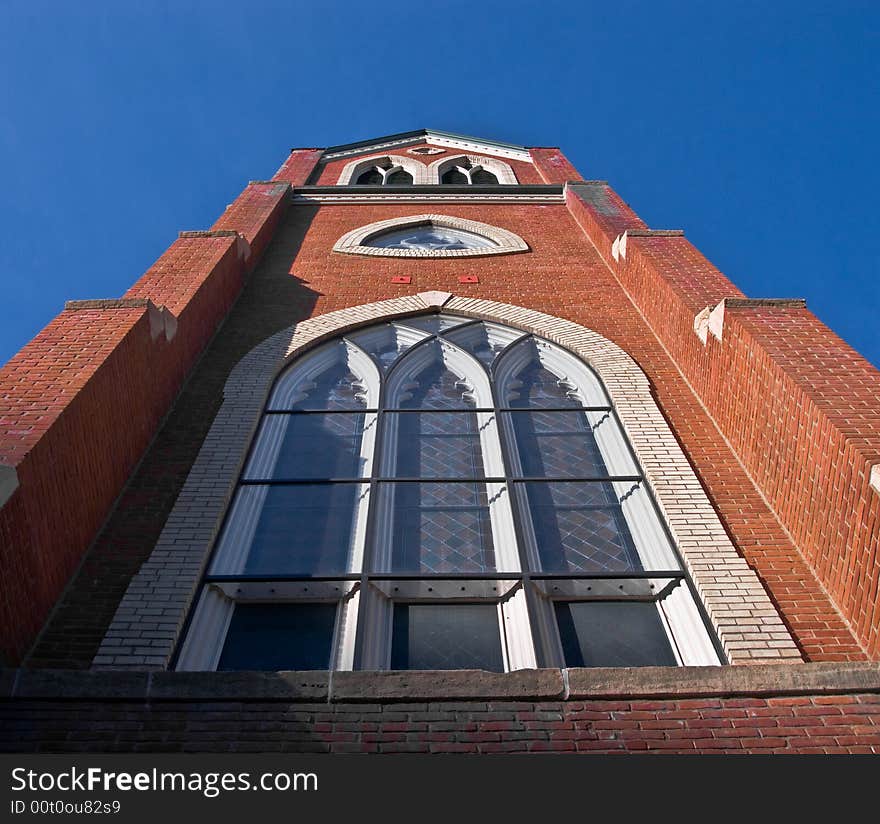 The facade of a church, rising up and up. The facade of a church, rising up and up.