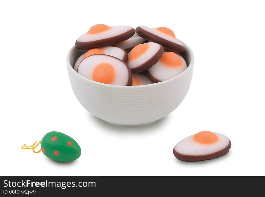 Easter marzipan eggs on white background.