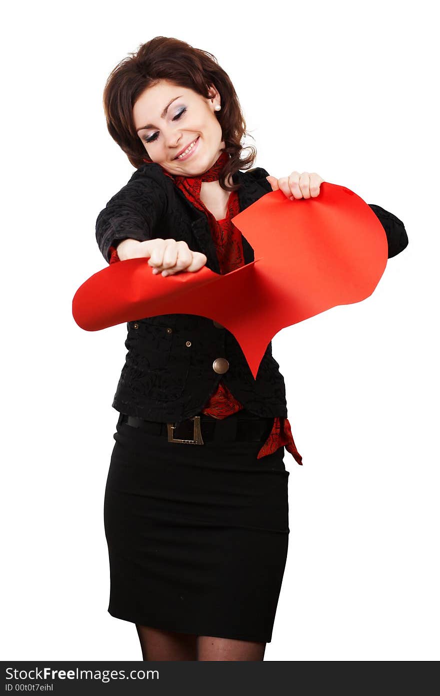 Woman tearing red peper heart