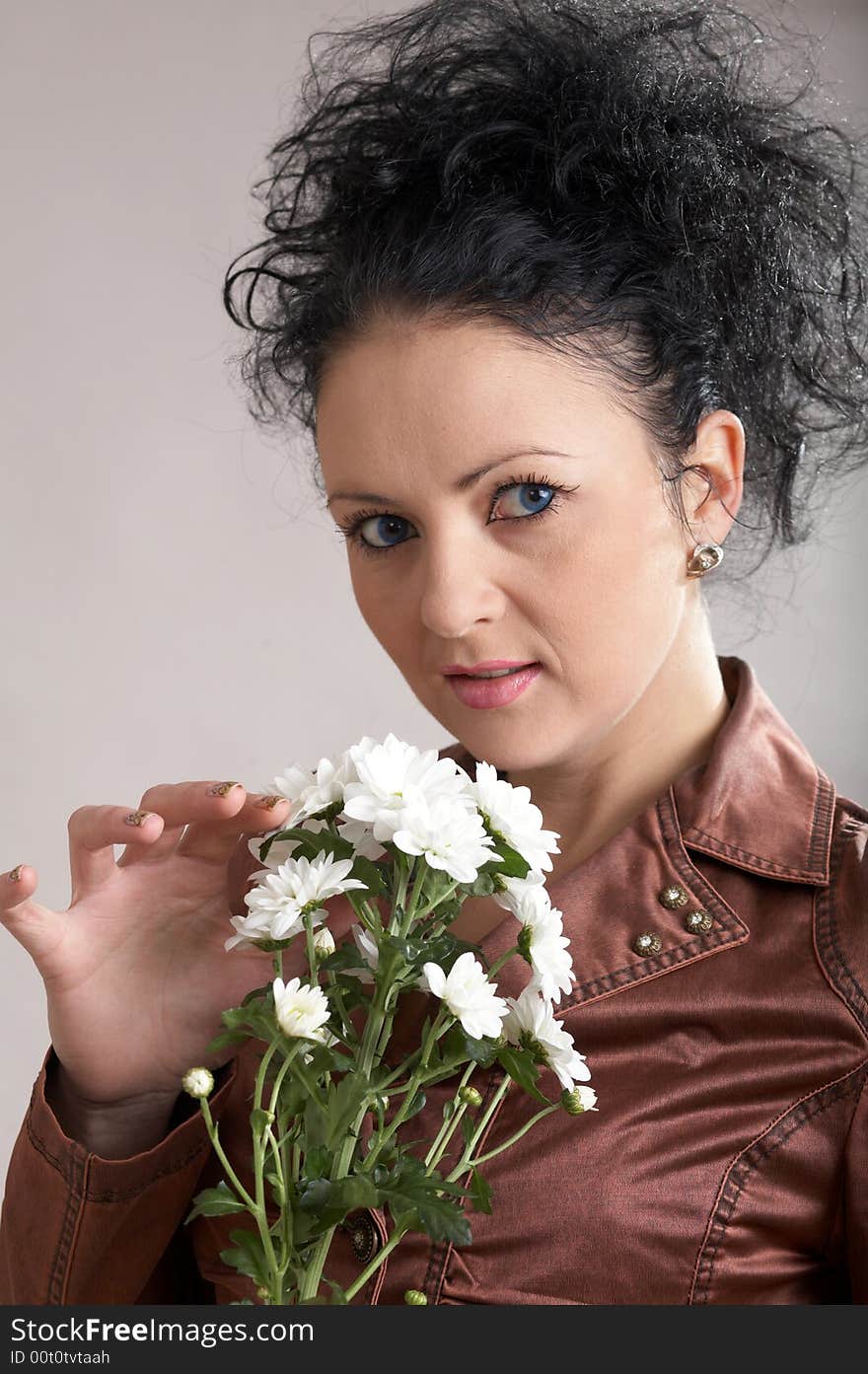 An image of beautiful woman with white flowers. An image of beautiful woman with white flowers