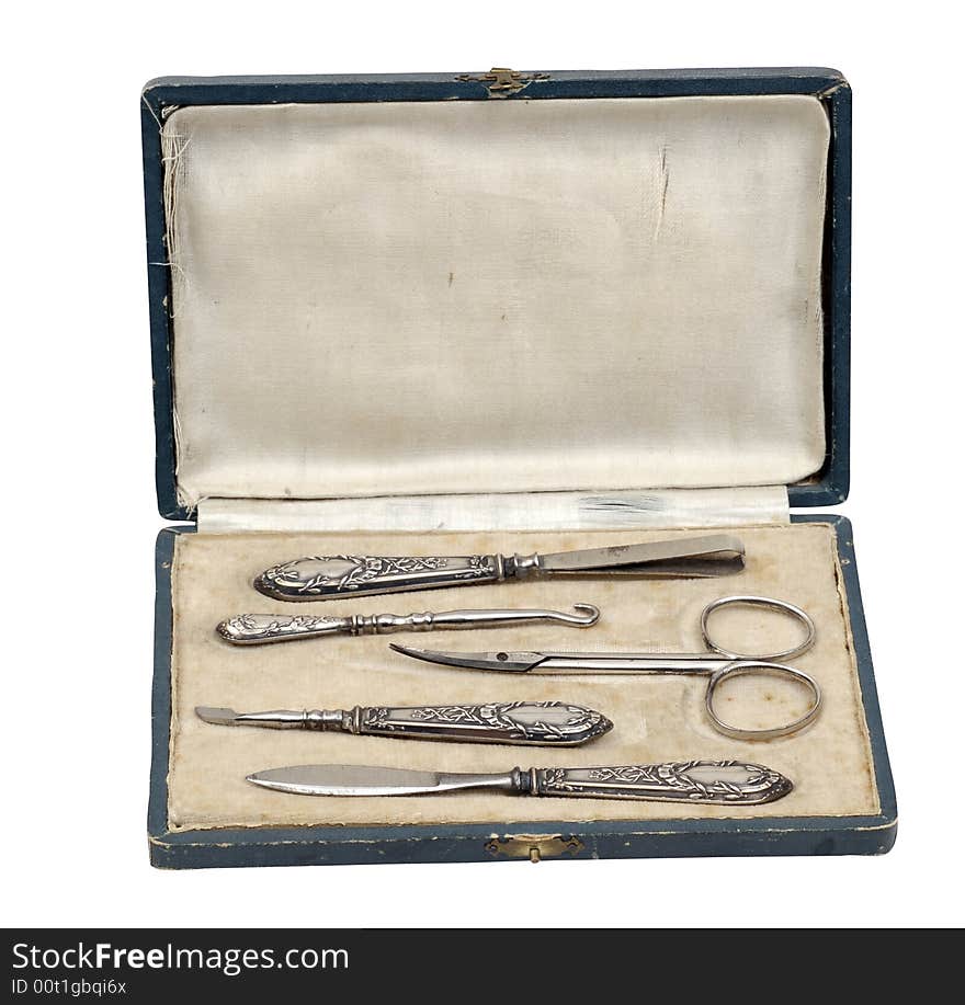 Isolated old antique object silver manicure set