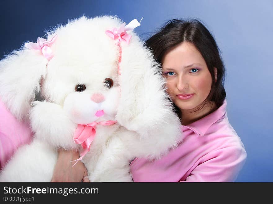 Young pretty girl with fluffy toy. Young pretty girl with fluffy toy