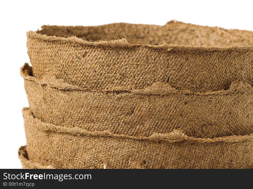 Detail of a stack of peat plant pots. Detail of a stack of peat plant pots.