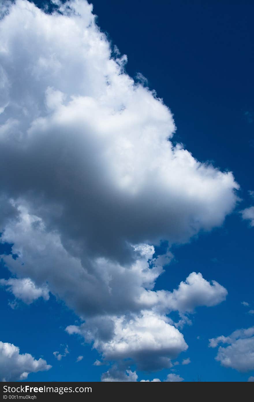 Blue sky with a big clouds on it on the sunny day. Blue sky with a big clouds on it on the sunny day