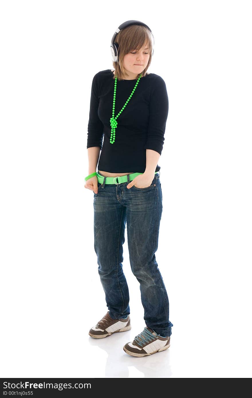 The young girl with a headphones isolated on a white background