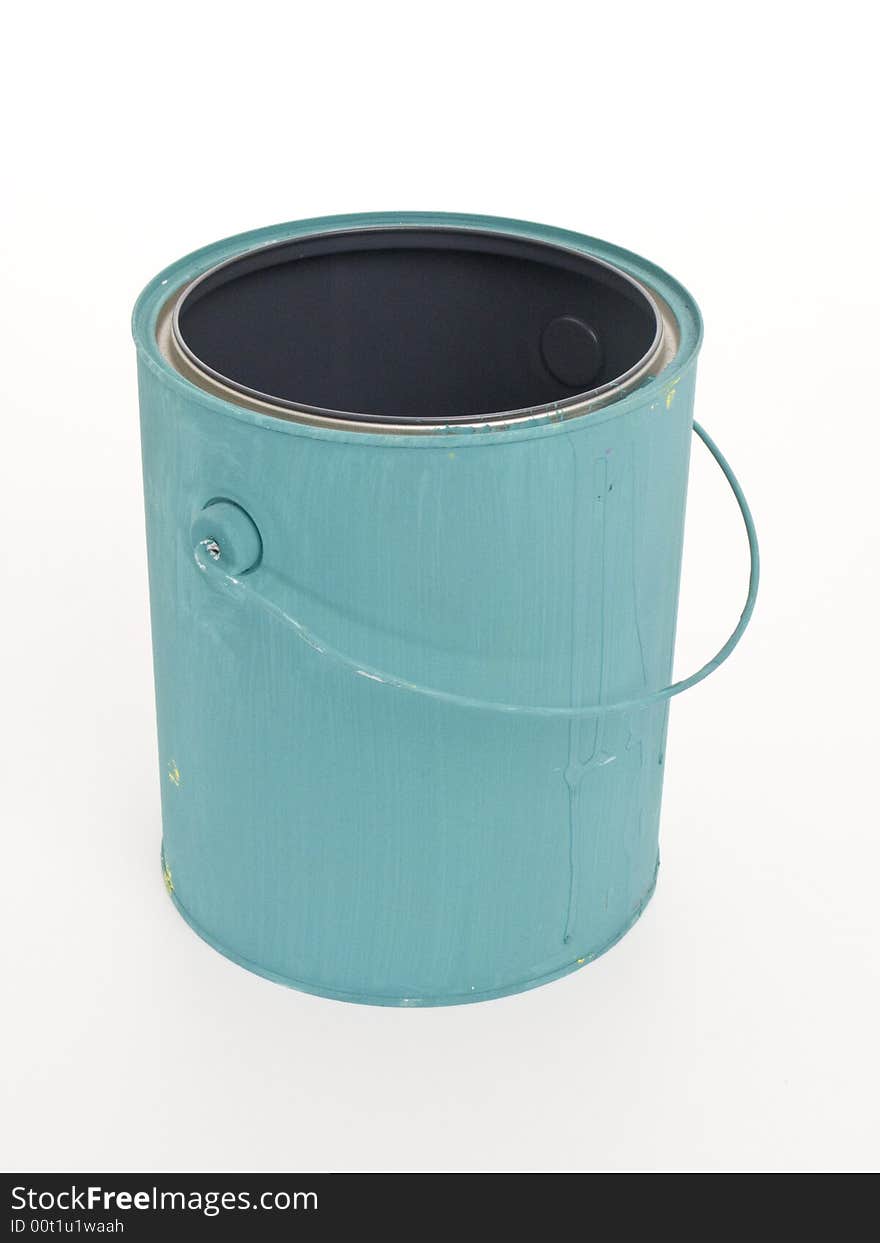 A gallon paint can painted blue with it's lid off on a white background.  The camera view can see inside the can. A gallon paint can painted blue with it's lid off on a white background.  The camera view can see inside the can.