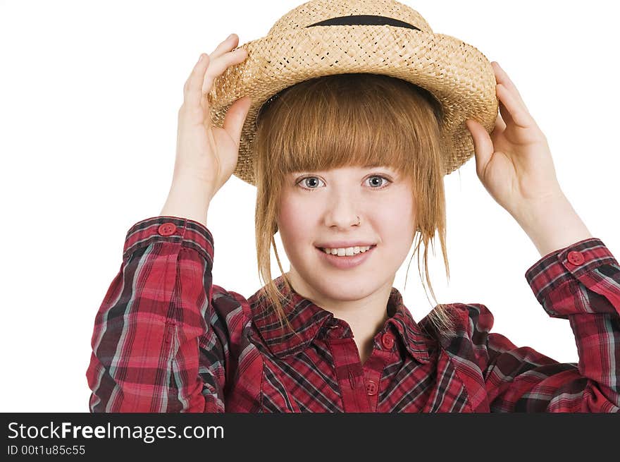 Girl with hand on hat in front