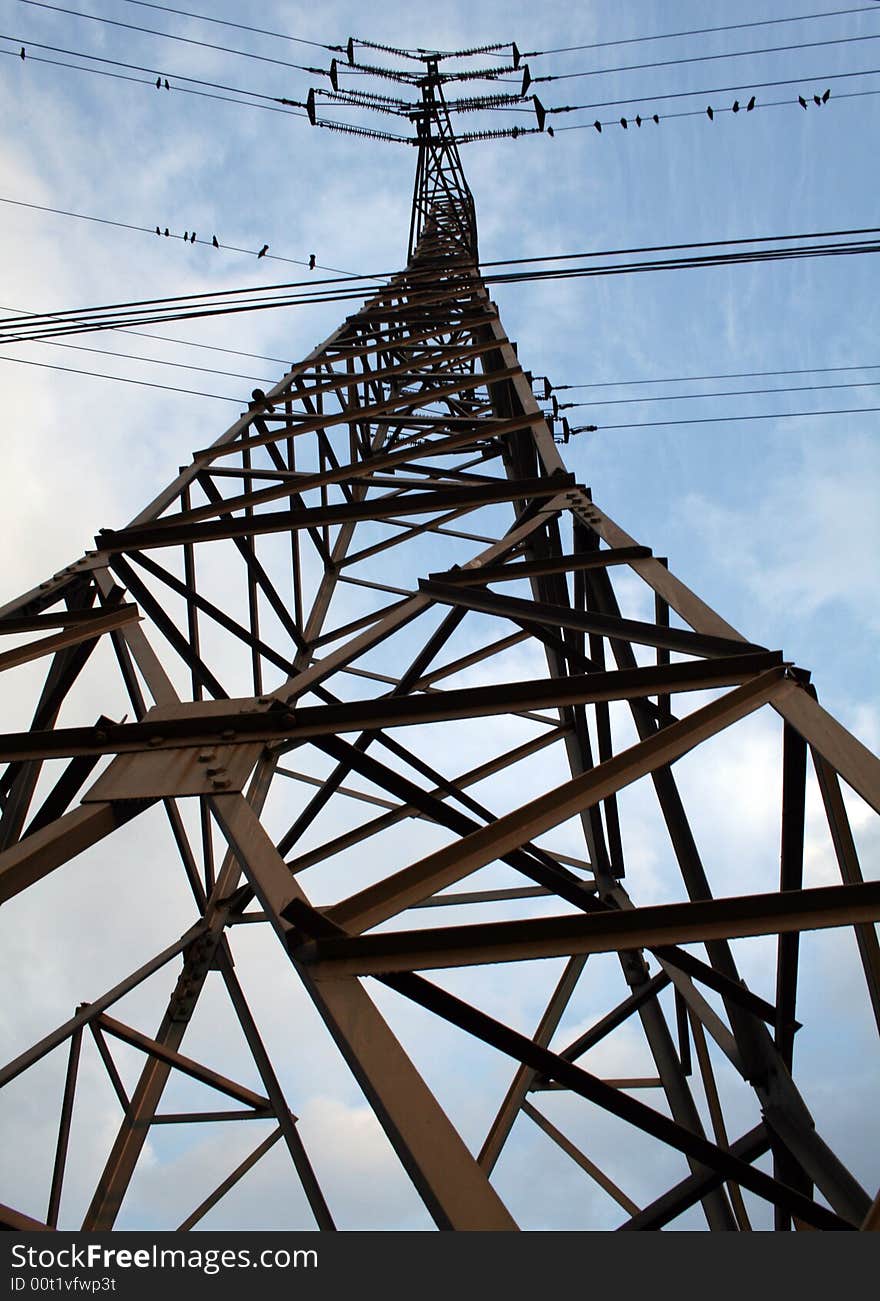 High voltage power lines on a pillar. High voltage power lines on a pillar